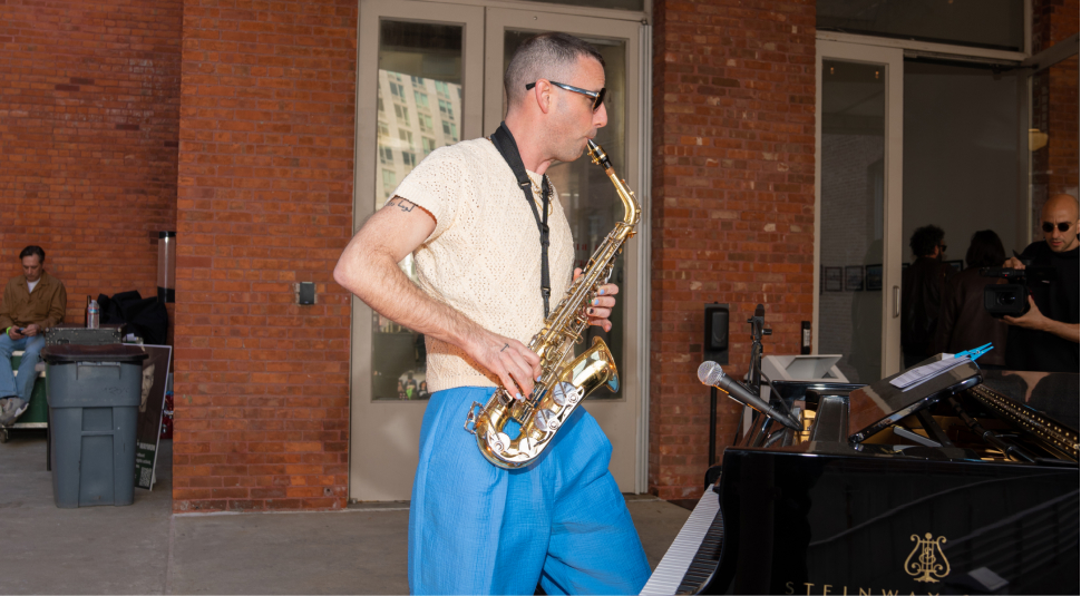Collis Browne playing the saxophone.